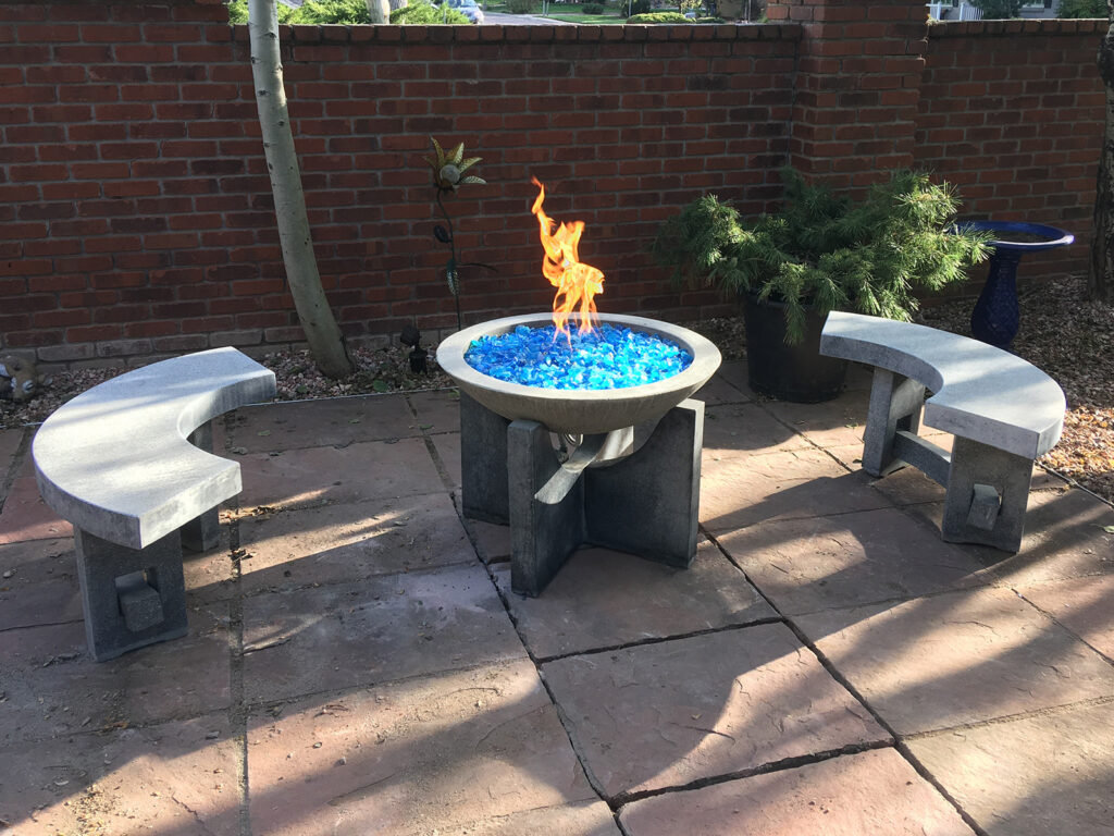 stone fire pit with blue glass