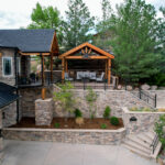 A Grand Entrance with a pergola and portico